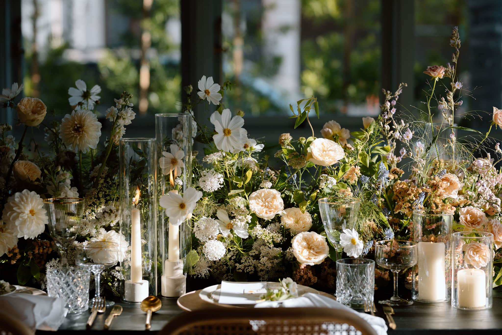a picture of the flowers and table decor for this wedding at this A Timeless Wedding Venue in Southern California